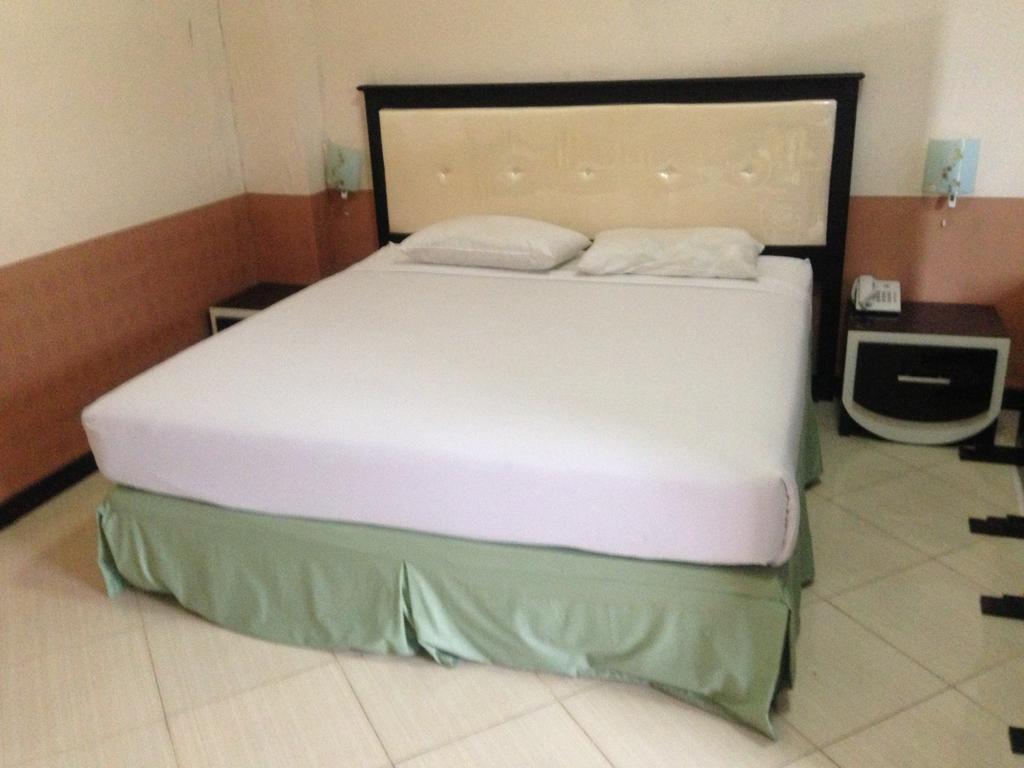 Global Inn Keluarga Sedati Cameră foto